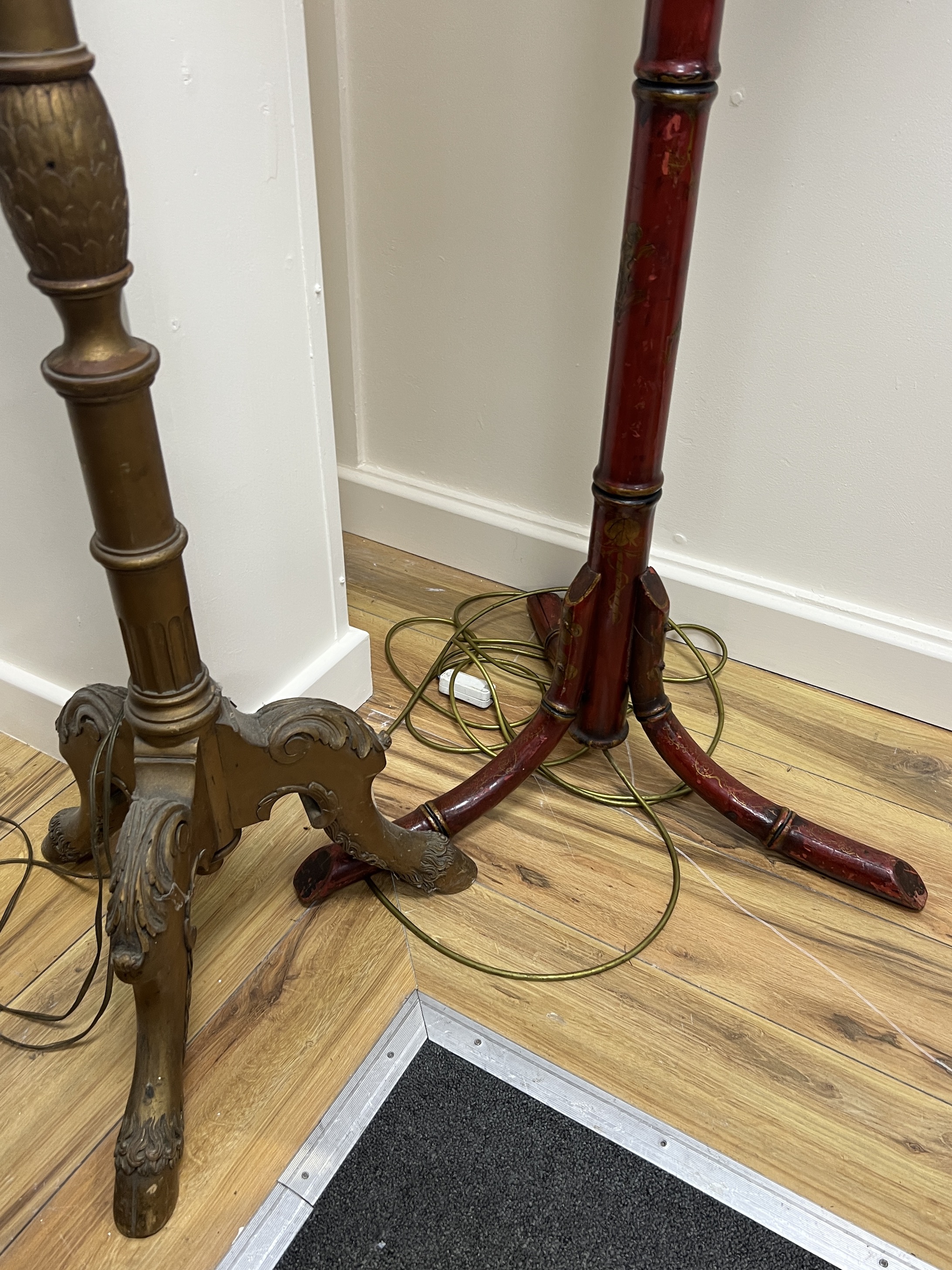 A chinoiserie lacquer faux bamboo lamp standard together with a giltwood standard lamp